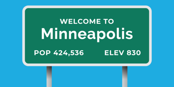 Town welcome sign for Minneapolis firewood with population