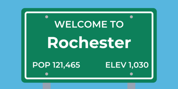A welcome sign to Rochester, MN, where we deliver firewood.