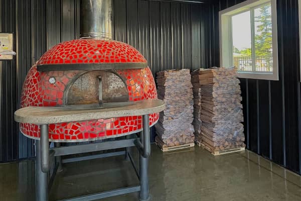 Kiln-dried firewood stacks delivered to a restaurant in Minnesota