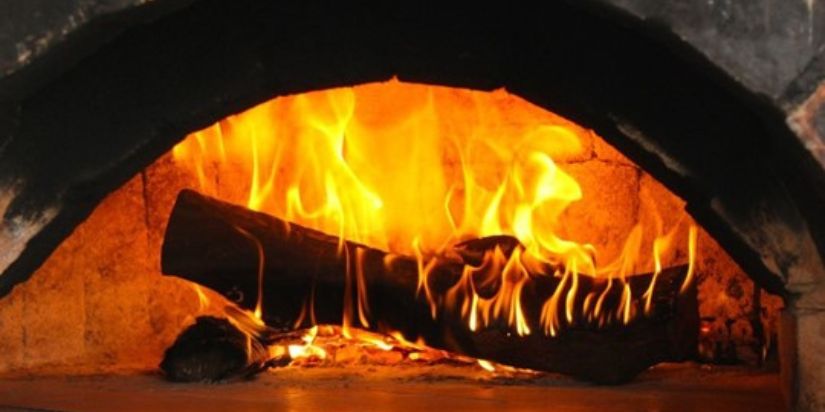 Fireplace burning with wood