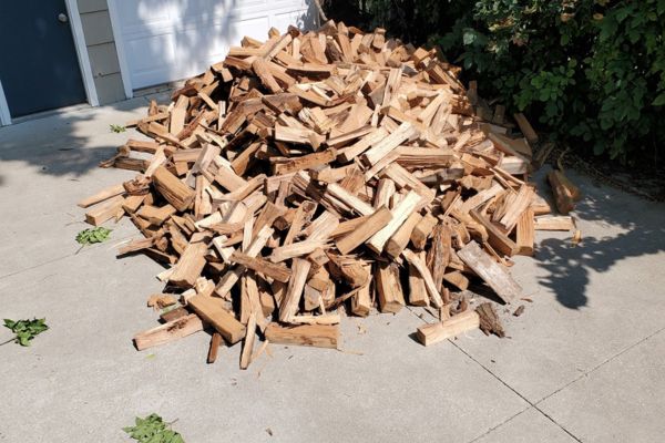 Pile of kiln-dried firewood for what is kiln-dried firewood blog